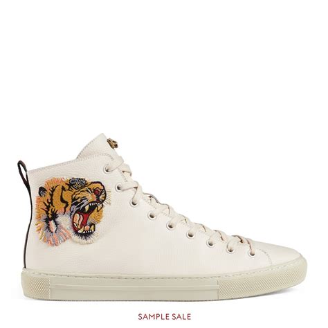 gucci white hightops with tigers